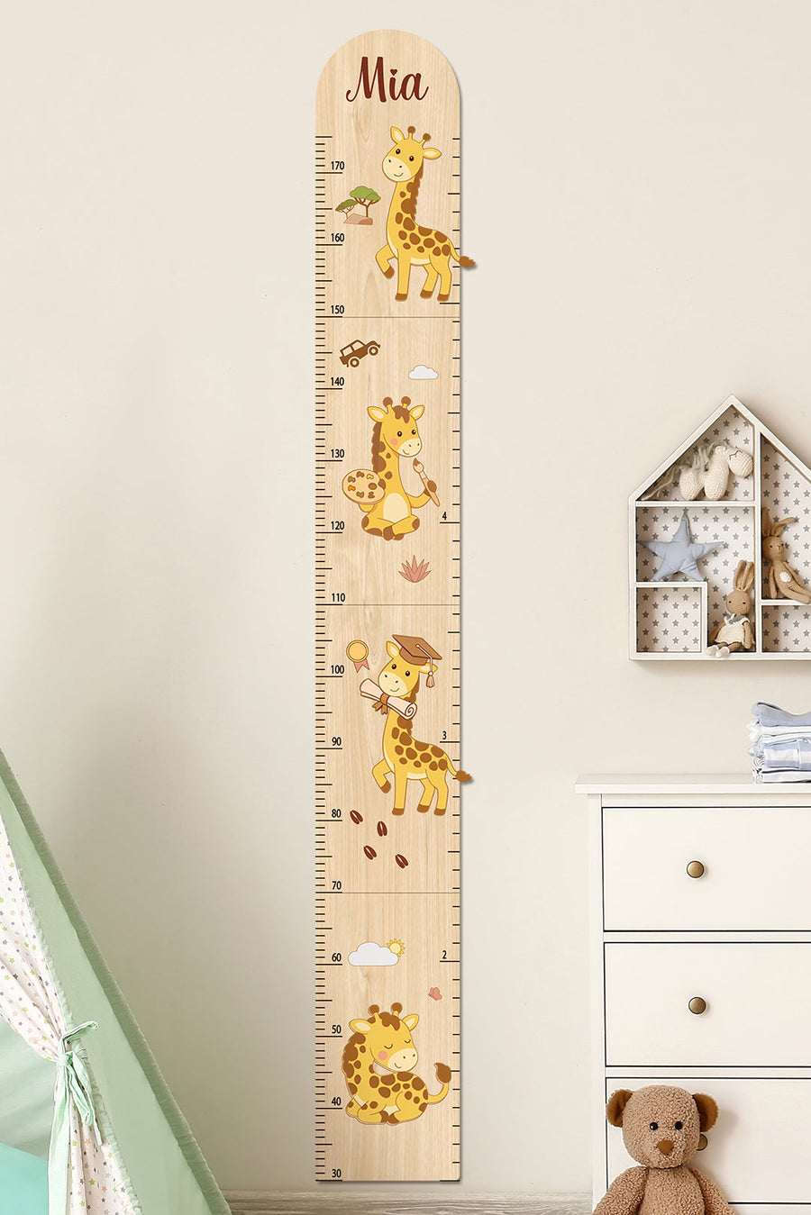 Personalised giraffe growth chart with child's name Mia, in a nursery